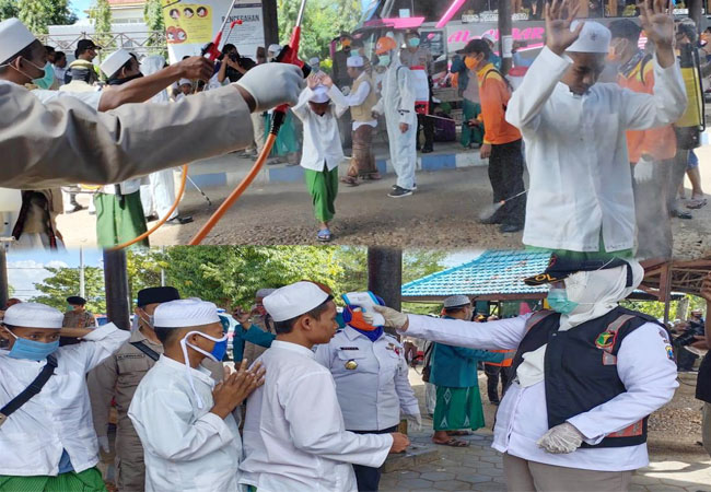 https://seputarmadura.com/wp-content/uploads/2020/04/196-Santri-Ponpes-Sidogiri-Tiba-di-Sumenep-Sambil-Diperiksa-dan-Disemprot-Desinfektan-.jpg